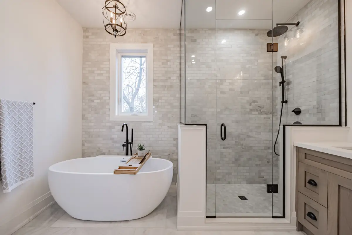 Marble shower and freestanding soaking tub bathroom