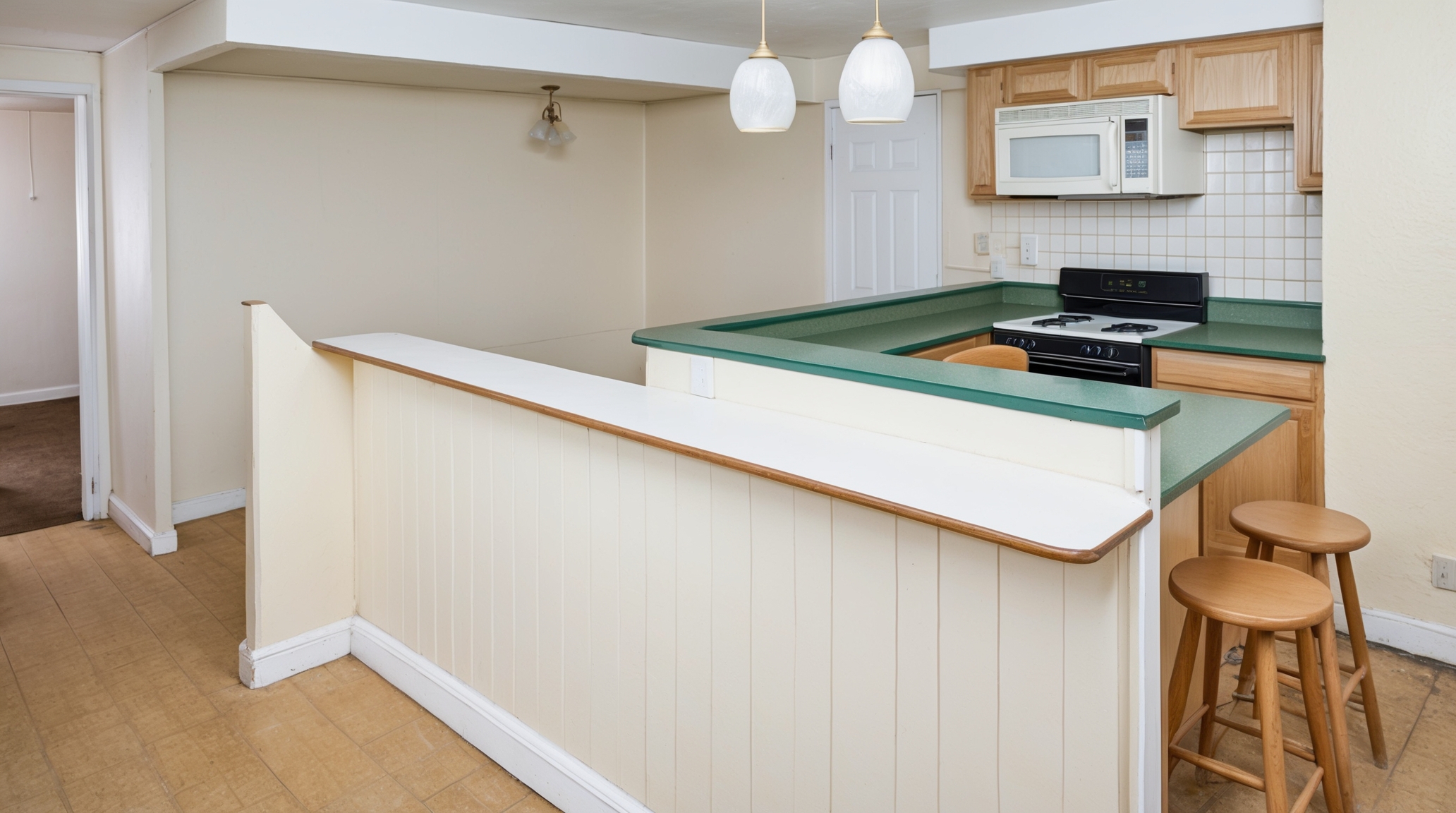 Before: dated 1980s tile-and-laminate kitchen in Boca Raton